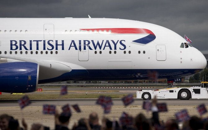 British Airways owner says Brussels bombs, Brexit clip sales