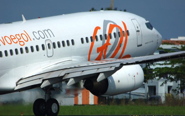 Hundreds of passengers evacuated as plane CATCHES FIRE before take-off