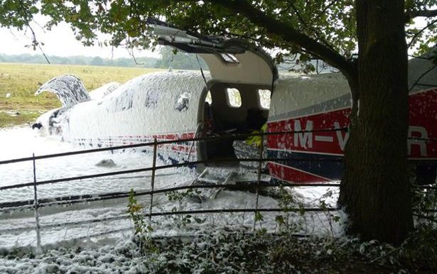 Pilots 'lucky escape' after brand new private jet crashes into field next to airport