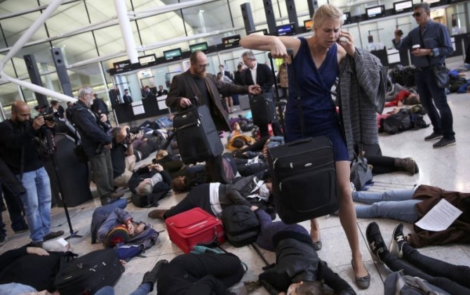 Protesters hold 'die-in' at Heathrow against airport expansion
