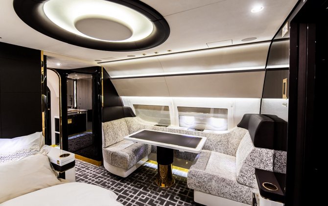 This massive private jet has an interior designed to look like a vintage train