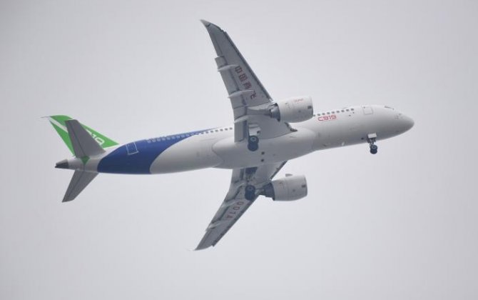 With maiden jet flight, China enters dog-fight with Boeing, Airbus